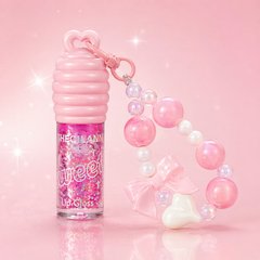 جلوس بلون زهري فاتح سحري لامع مع ميدالية أنيقة – Sweet Lip Gloss Cos-220426-23